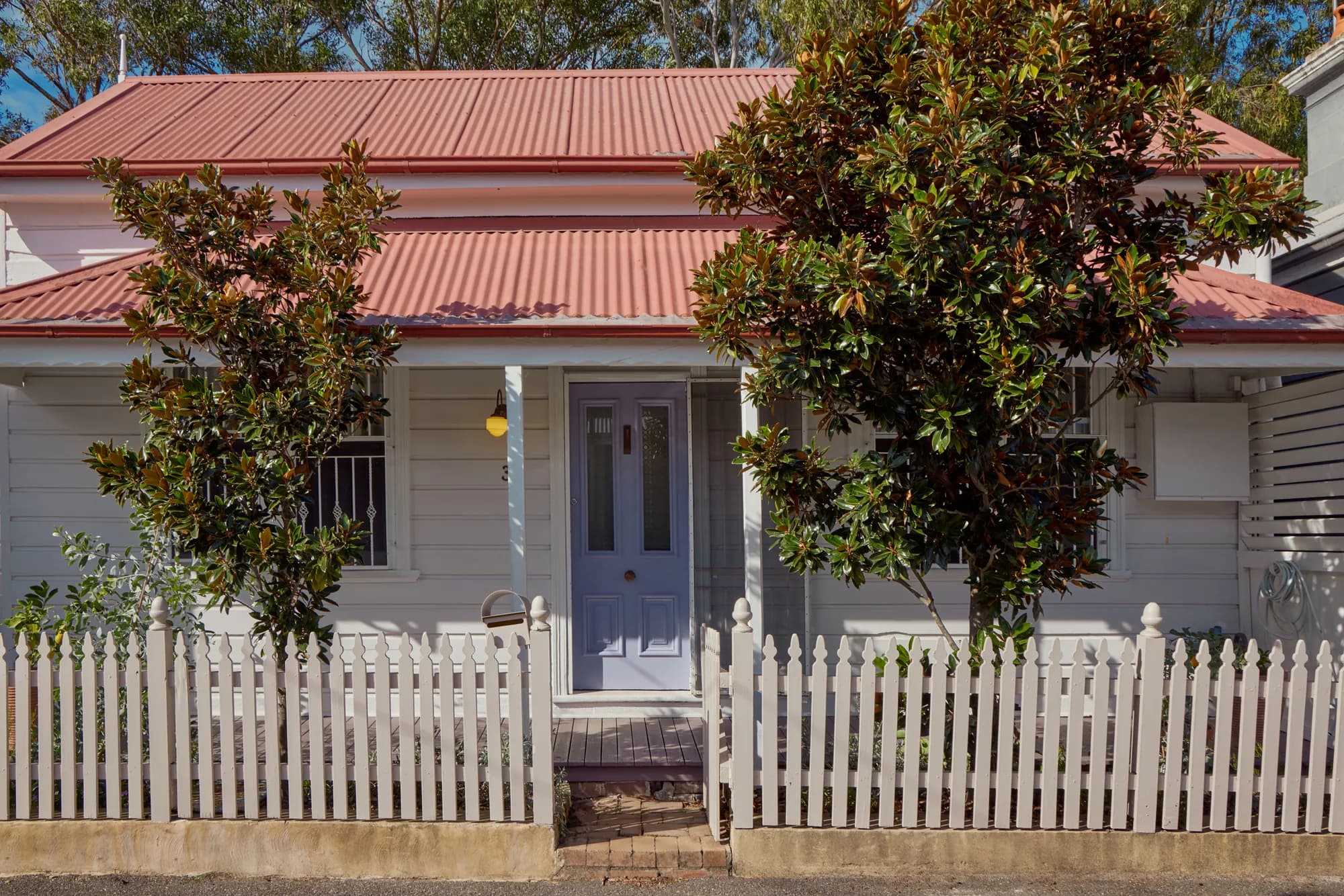 The original weatherboard cottage from the street.