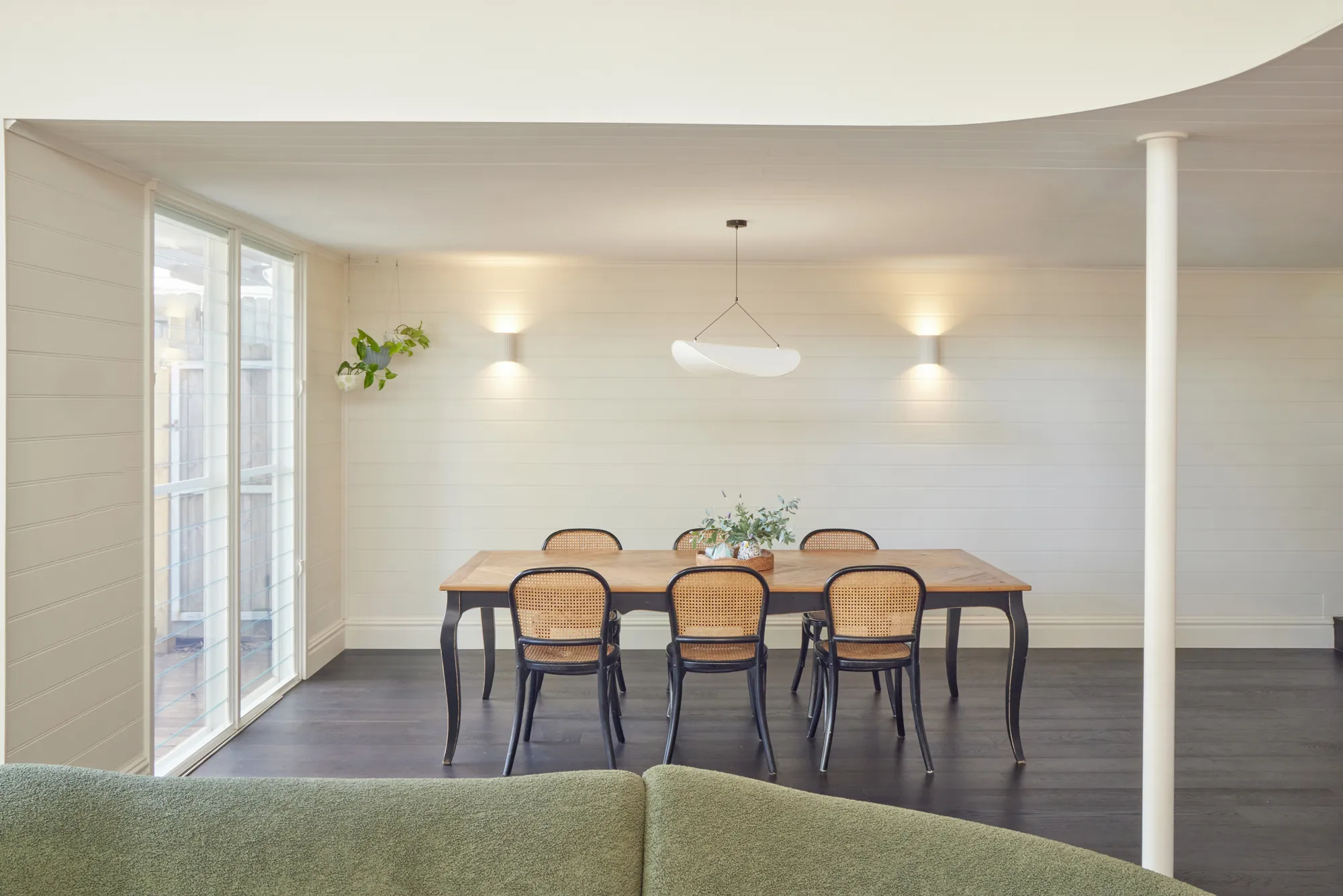 Dining beneath the curved ceiling.