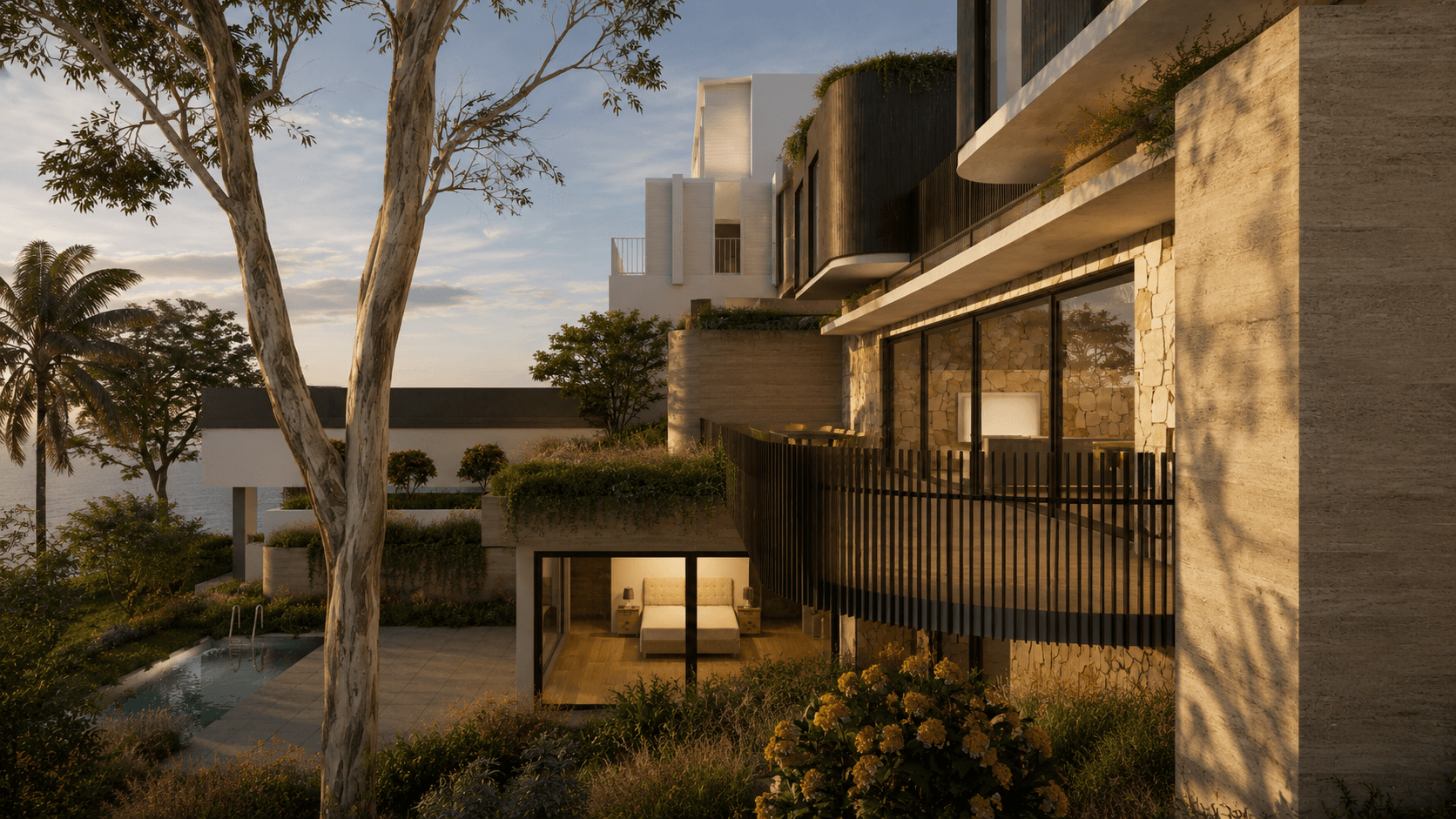 Contemporary coastal home with layered concrete forms, stone walls, timber screening and landscaped gardens framing a sheltered outdoor living area.